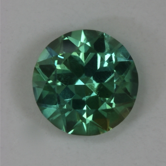 A very fine pastel blue green droplet of color. #127