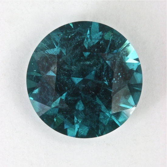 Included, but a great saturated blue color round. #131
