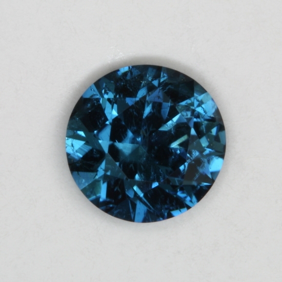 A true blue Indicolite in a medium toned droplet of color.#133