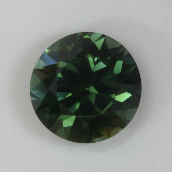 Highly dichroic, darker forest green round. #139