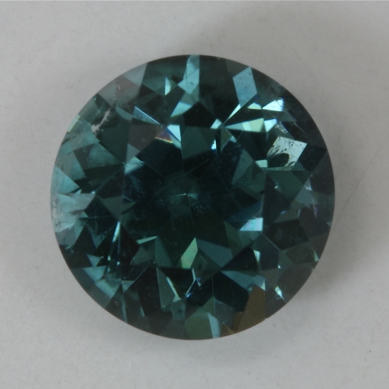 A fine medium lightly toned stable blue droplet of color. #144