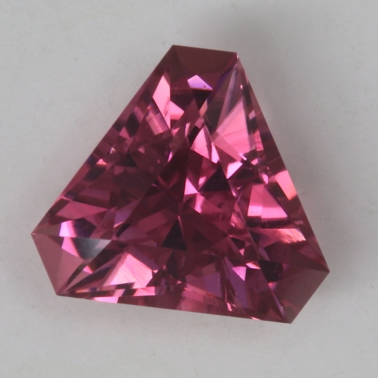 Average medium toned pink in a different triangular cut.#166