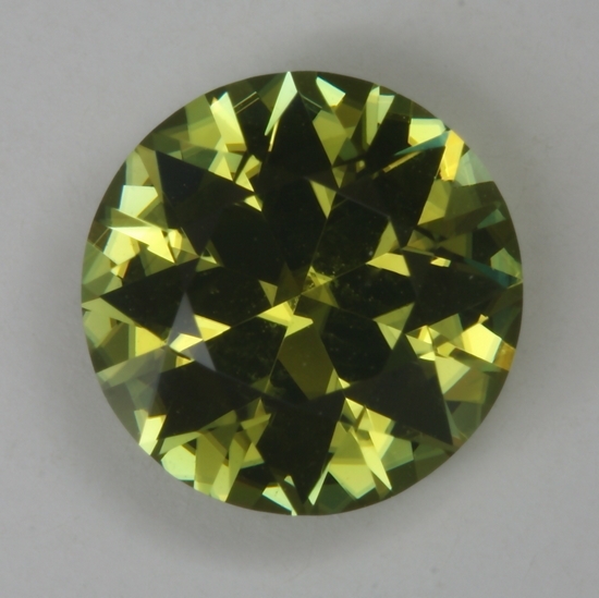 Fine, medium toned, yellow green droplet of color.  #172