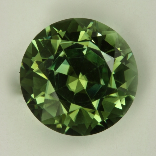 Excellent, deep,medium toned, evenly green round.  #192