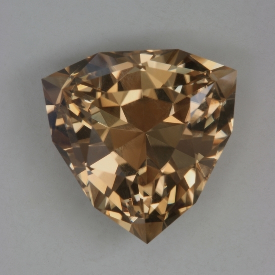 A larger shield cut of bright flashing wheat color.  #263