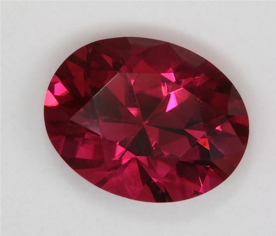 Slightly included almost hot, almost red, beautiful pink oval.  #266