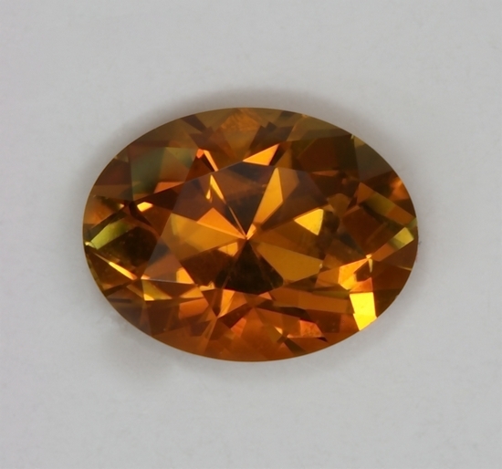 A richer golden color oval with a wash of brown.  #269