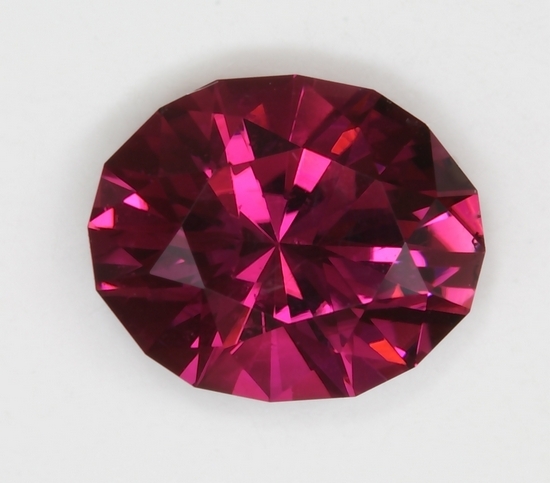 Darker raspberry pink oval with moderate flash.  #275