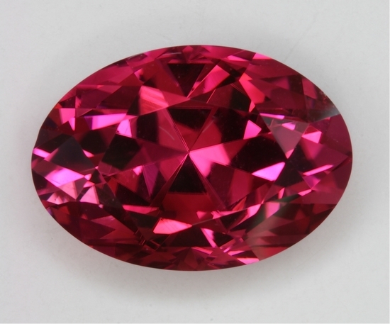Bright, flashy, hot pink with zoning, oval.  #286