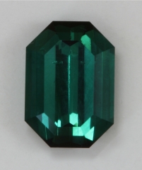 Bright snappy blue green steep ended emerald cut.  #352
