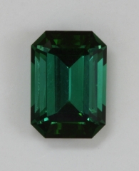 Beautiful, slightly dichroic, saturated green, emerald cut.  #372