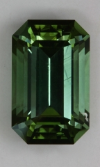 Strongly dichroic with completely closed ends, blue, emerald cut.  #378