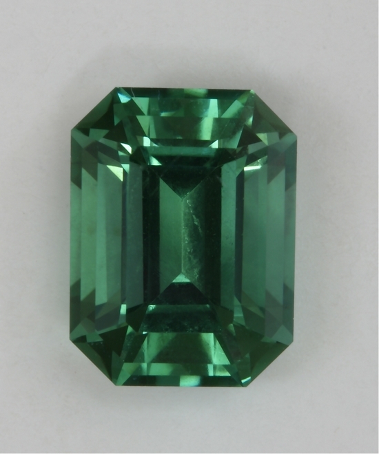 Beautiful green emerald cut that is not visible dichroic.  #408