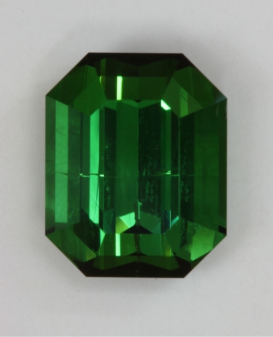 Flawed, flashy, medium toned green, emerald cut, Mozambique  #431
